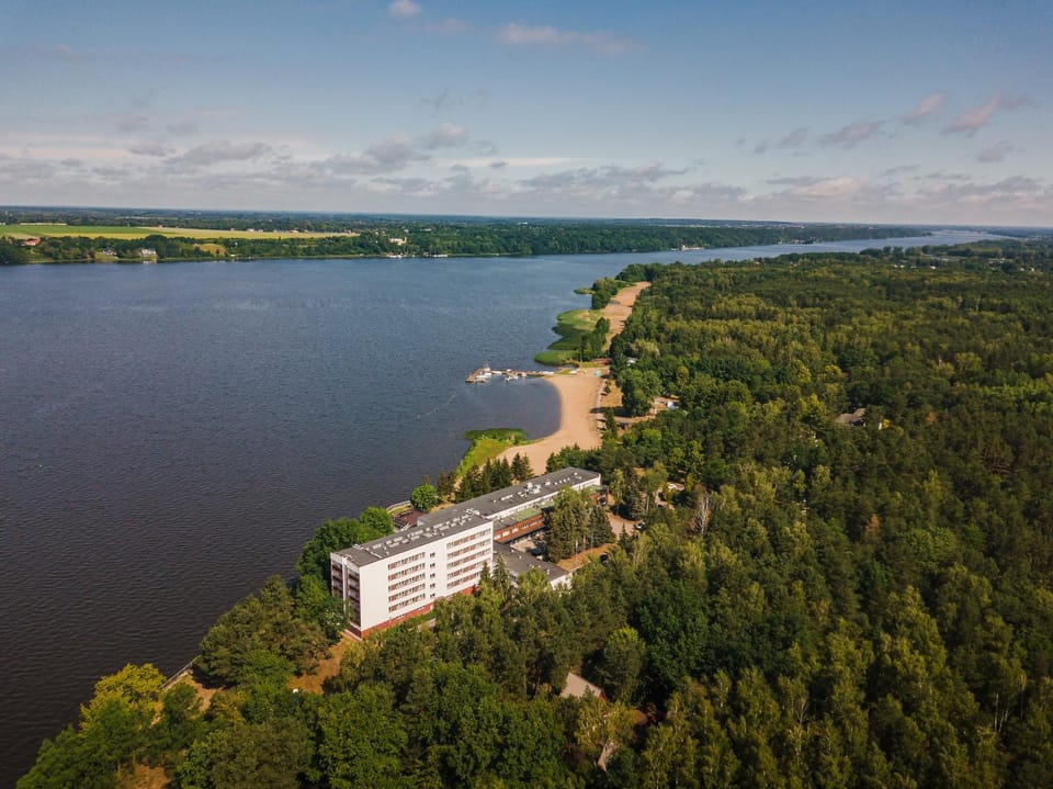 Property building, Day, Natural landscape, Beach, Lake view