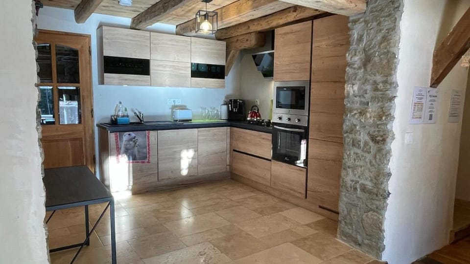 Kitchen or kitchenette, dishwasher, oven, stove, toaster