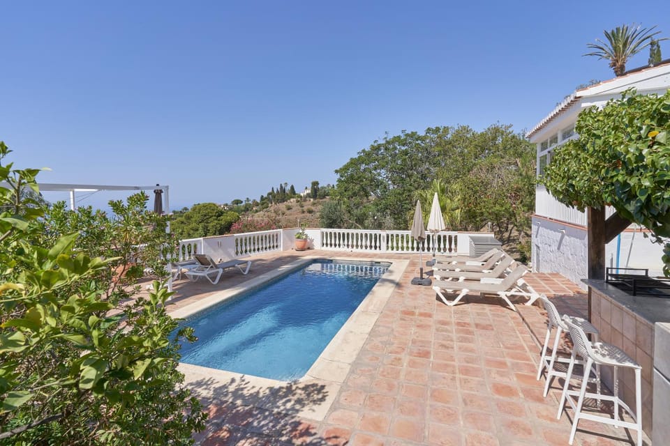 Property building, Living room, Swimming pool