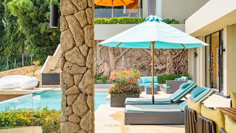 Property building, Garden, Seating area, Sea view, Swimming pool, sunbed