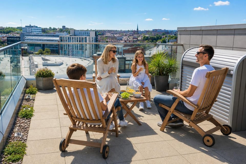 Patio, Day, People, View (from property/room), Balcony/Terrace, Seating area, Guests, City view, group of guests