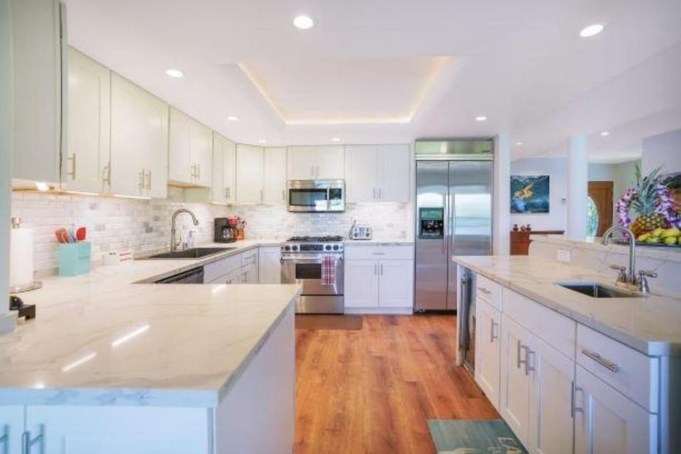Kitchen or kitchenette, dishwasher, oven, stove