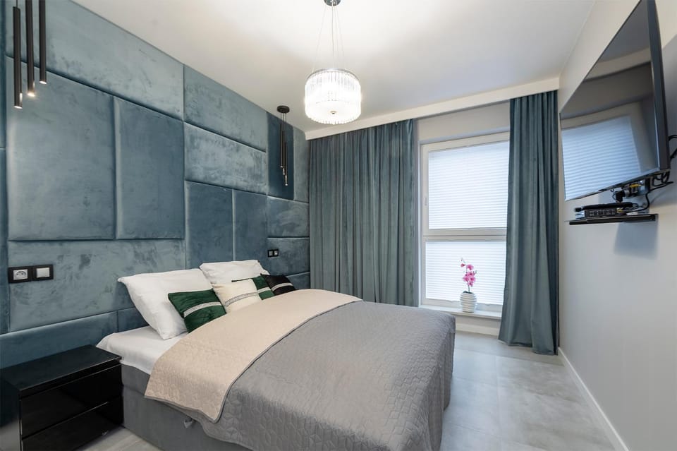 Manufaktura's STAR ***** apartment by PinPoint Apartment in Masovian Voivodeship