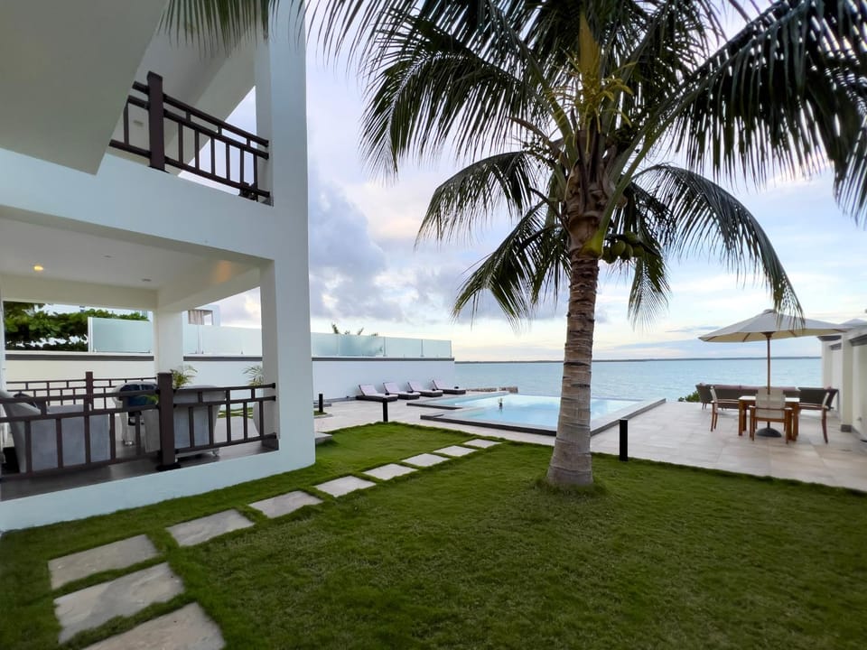 Property building, View (from property/room), Balcony/Terrace, Garden view, Pool view, Sea view, Swimming pool