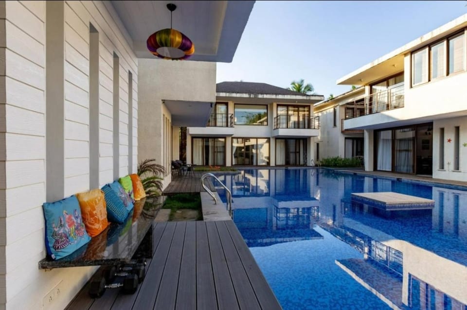 Property building, Patio, Day, Pool view, Swimming pool