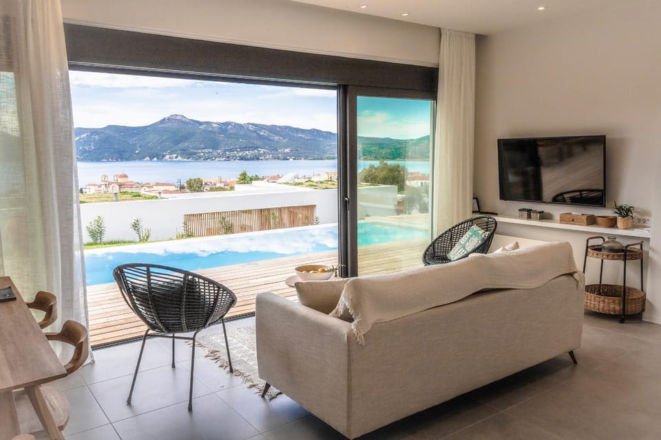 View (from property/room), Living room, Mountain view, Swimming pool