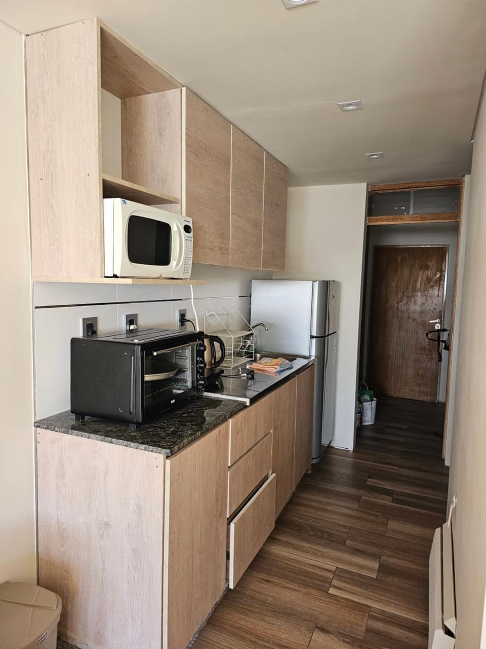 Kitchen or kitchenette, furniture, microwave, oven, kitchen