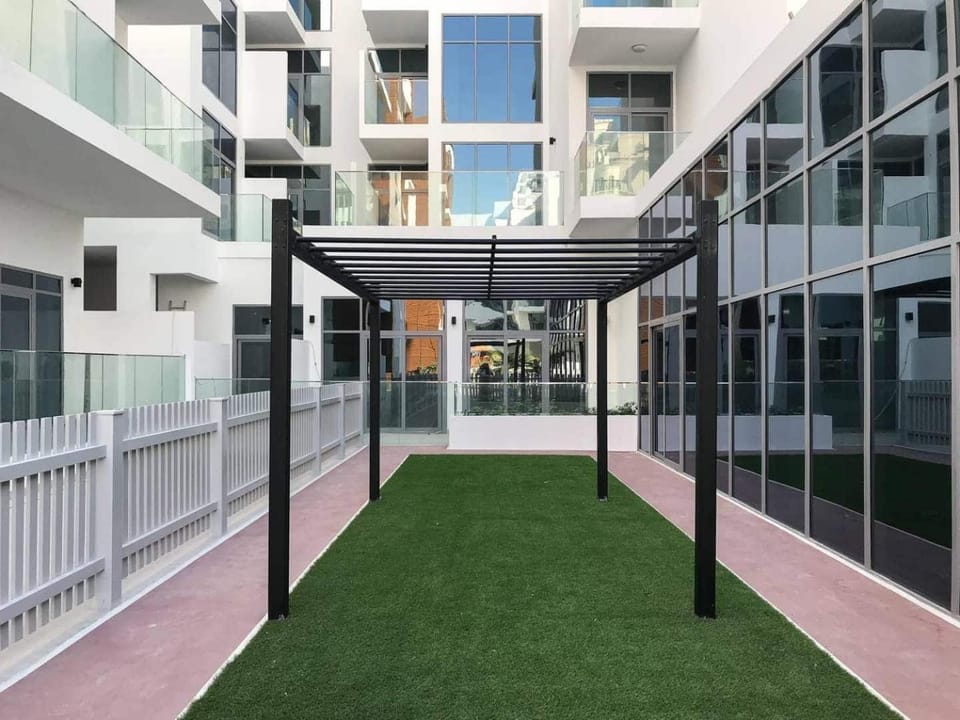 Modern 1BR in Jumeirah Village Circle (Pool View) Apartment in Dubai