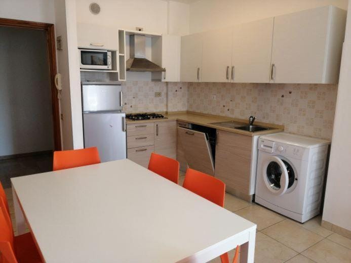 Kitchen or kitchenette, Dining area, dishwasher, washing machine
