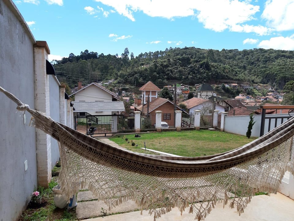 Casa MAGNÍFICA a 1 Km do centrinho com Suíte e Hidro House in Monte Verde