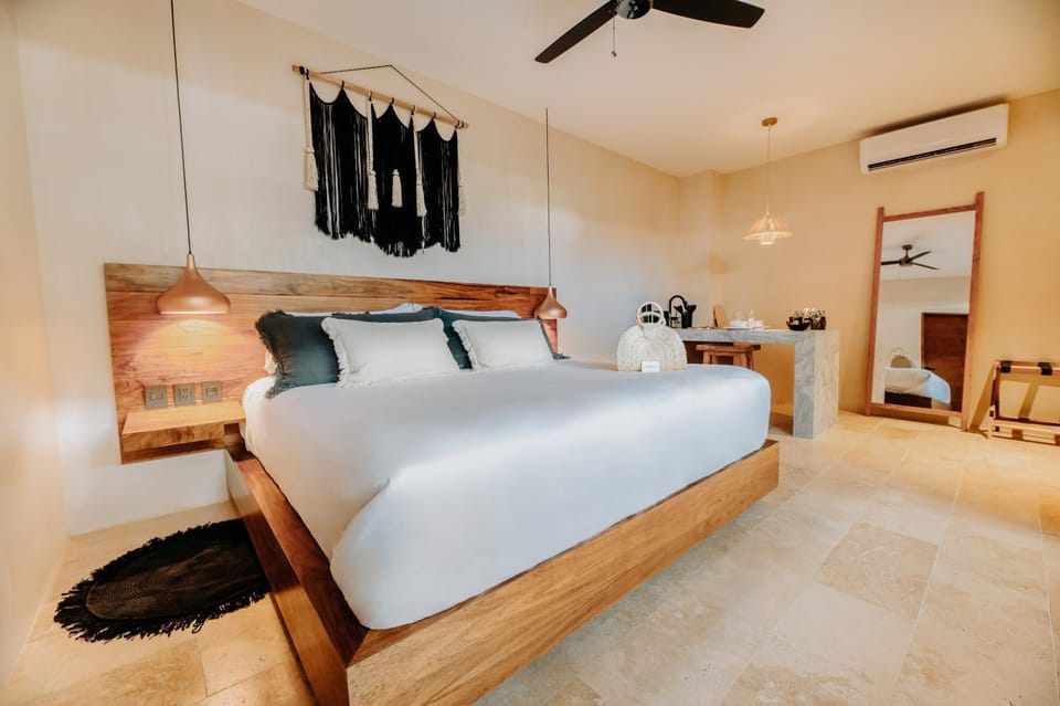 Bed, Photo of the whole room, Decorative detail, Bedroom, fireplace, hair dresser, air conditioner