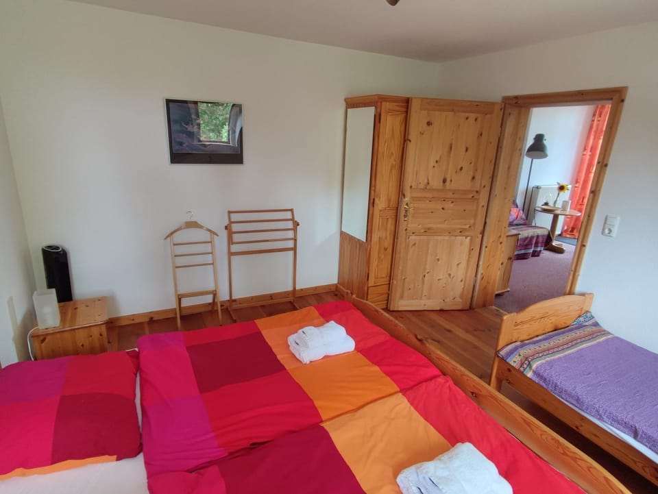 Bed, Photo of the whole room, Bedroom, fireplace, towels, wardrobe