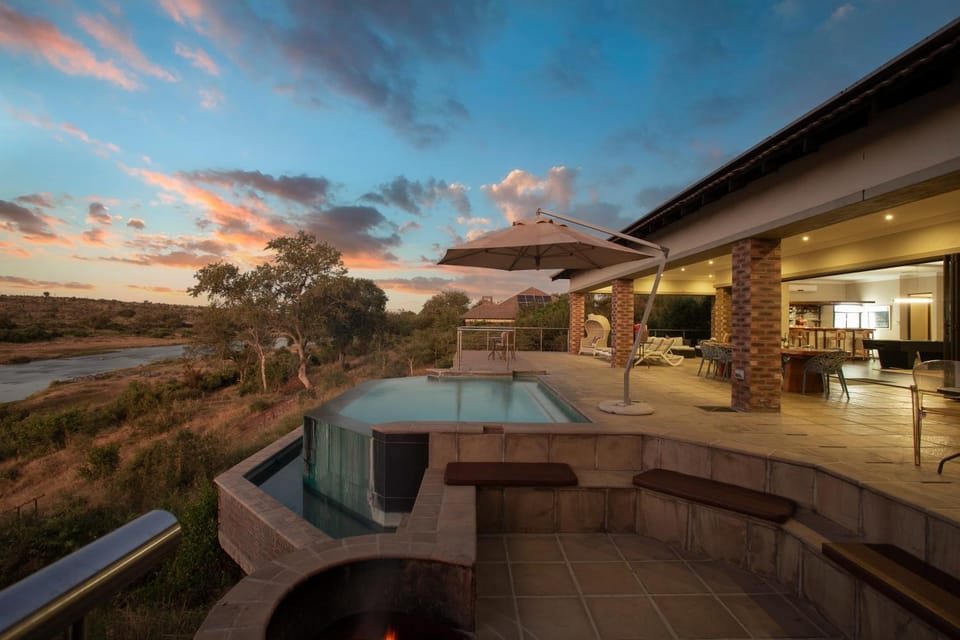 Property building, Patio, Natural landscape, View (from property/room), Balcony/Terrace, Seating area, Landmark view, Pool view, River view, Swimming pool, Sunrise, VIP