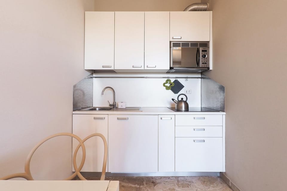 Kitchen or kitchenette, stove