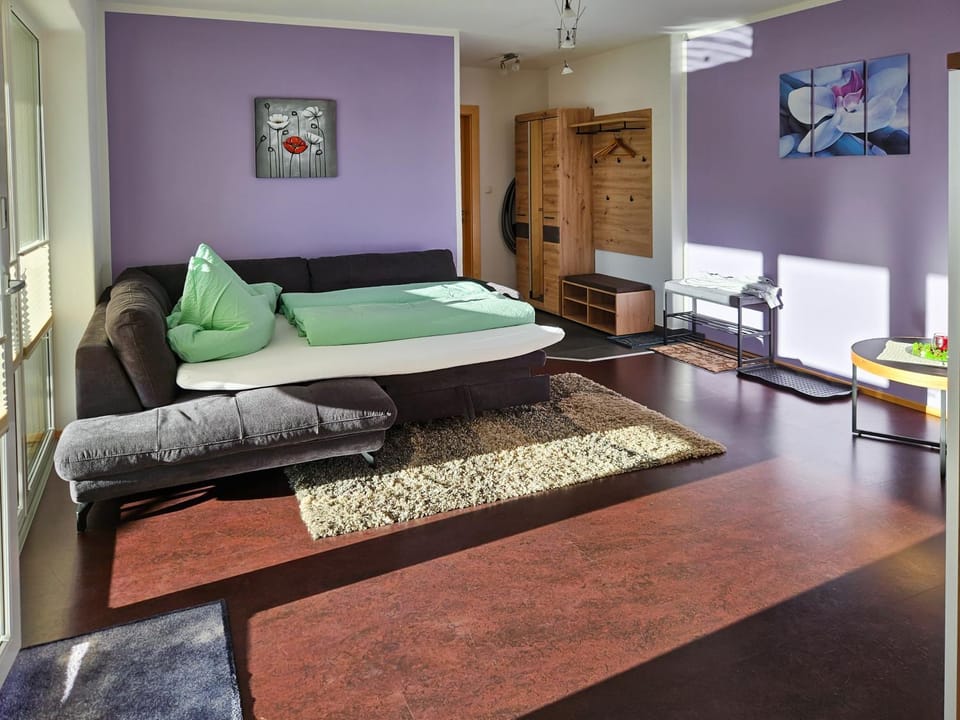 Bed, Living room, Seating area, wardrobe