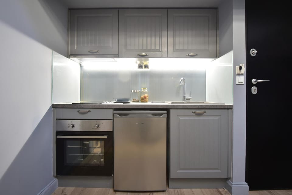 Kitchen or kitchenette, oven, stove