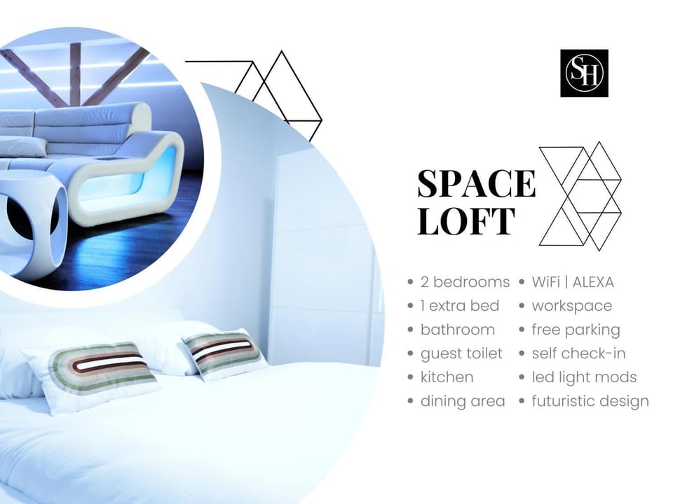 Bed, Living room, Seating area, Logo/Certificate/Sign, Logo/Certificate/Sign, Bedroom