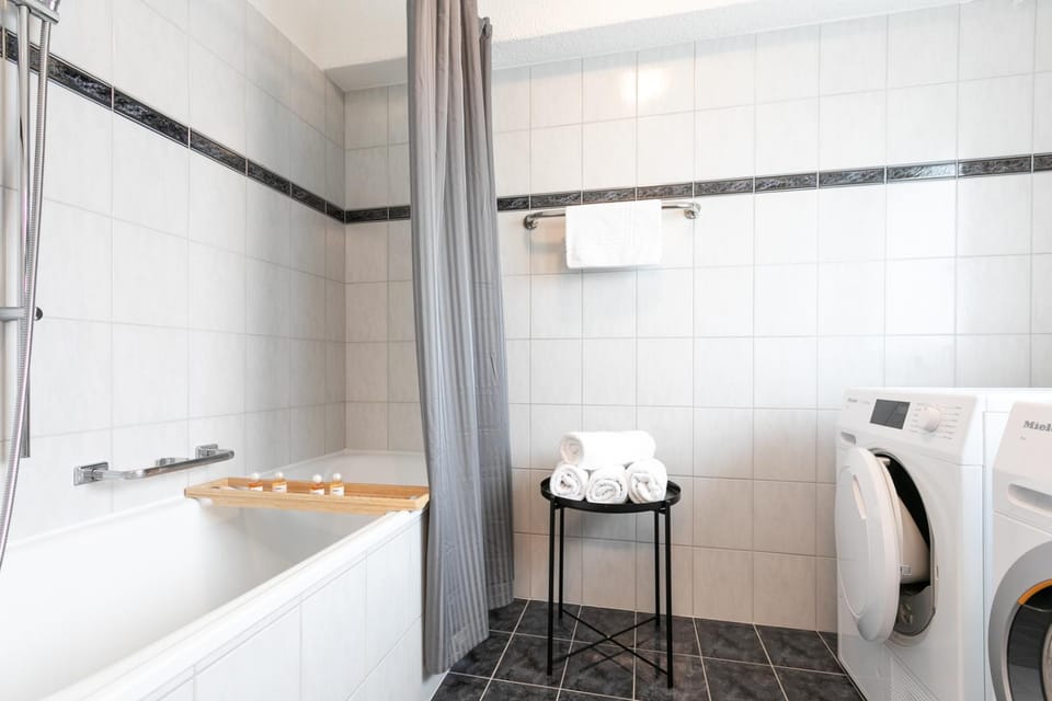 Shower, Bathroom, towels, washing machine, dryer