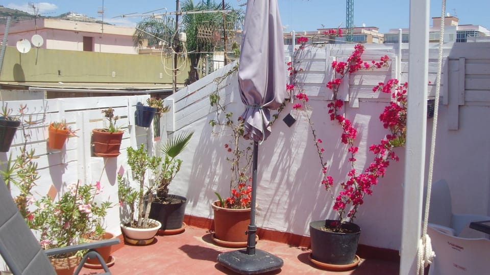 Central Attic Apt Sleeps 4 with Patio Apartment in Almuñécar