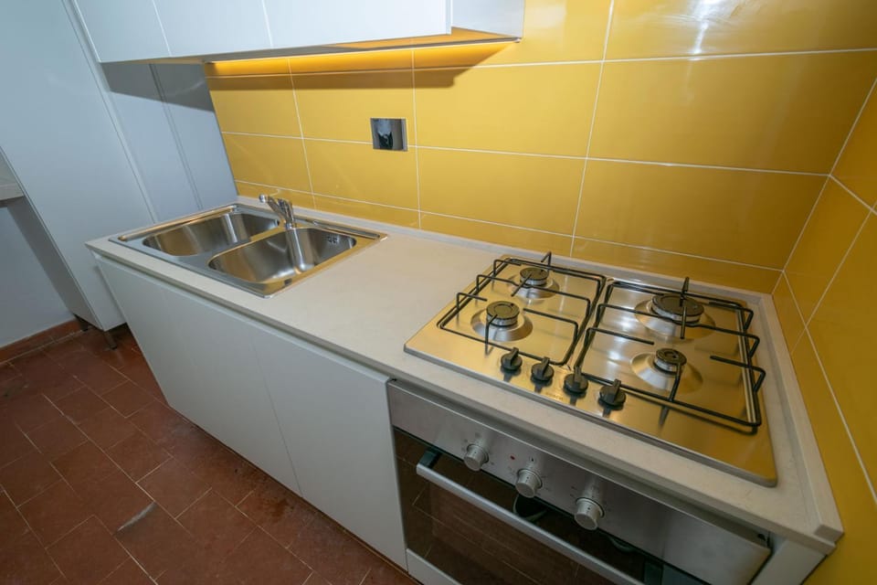 Kitchen or kitchenette, stove