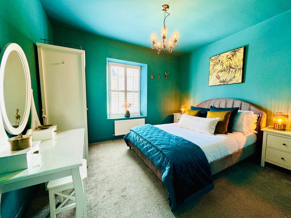 Bed, Photo of the whole room, Bedroom, hair dryier, towels, wardrobe