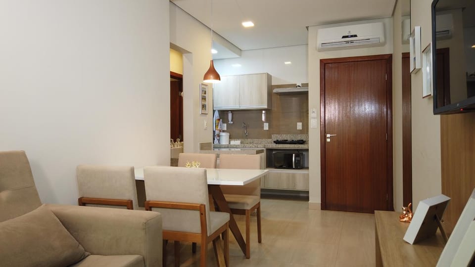TV and multimedia, Kitchen or kitchenette, Living room, Dining area, stove, air conditioner