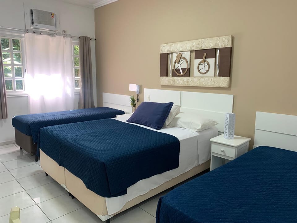 Bed, towels, air conditioner