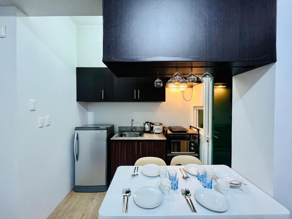 At Home Condo With Free Pool Access Apartment in Muntinlupa