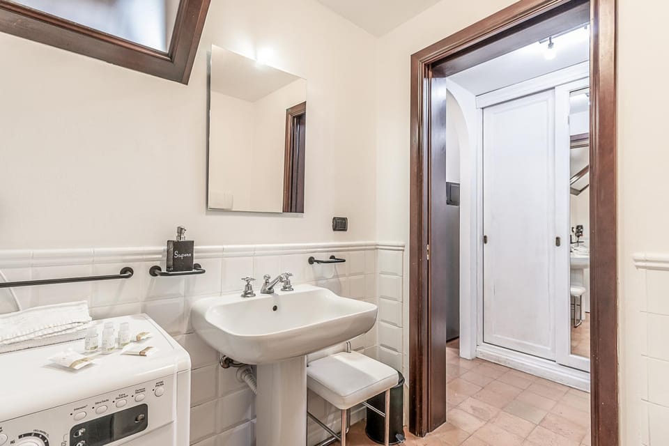 Shower, Toilet, Bathroom, towels, washing machine, dryer