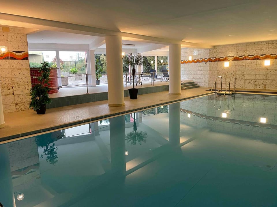 Property building, Living room, Swimming pool