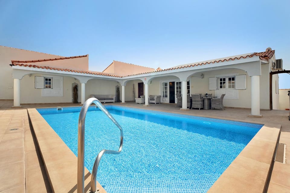 Property building, Living room, Swimming pool