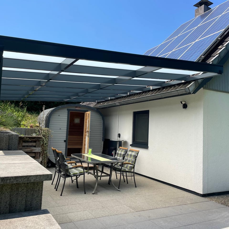 Property building, Patio, Sauna, Balcony/Terrace, Seating area, Dining area