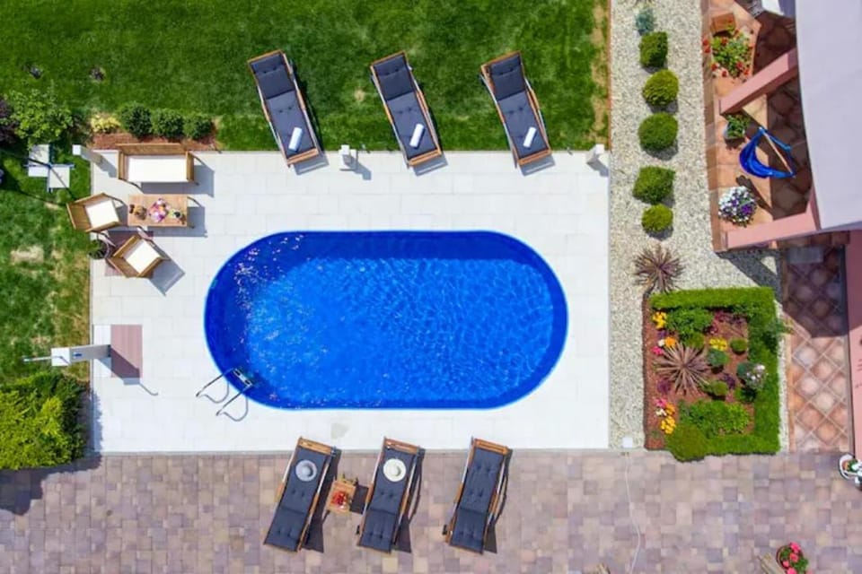 Patio, Day, Garden, Pool view, Swimming pool, sunbed
