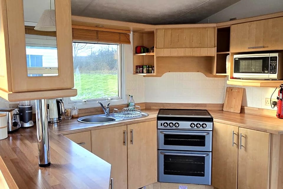 Kitchen or kitchenette, oven, stove, toaster