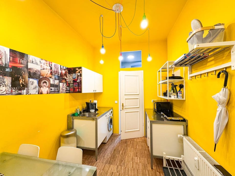 Kitchen or kitchenette, microwave, stove, washing machine, kitchen