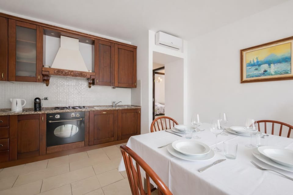 Kitchen or kitchenette, Dining area, dishwasher, oven, stove, air conditioner