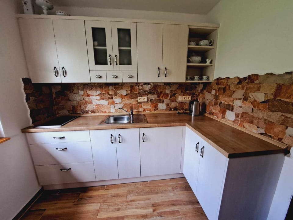 Kitchen or kitchenette, stove, kitchen
