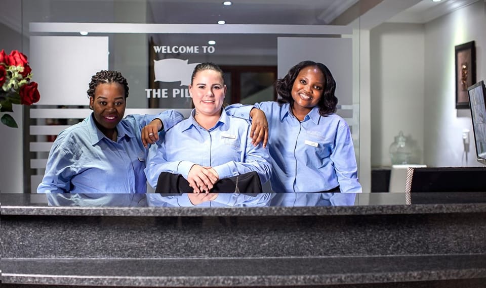 Staff, Property logo or sign, Lobby or reception