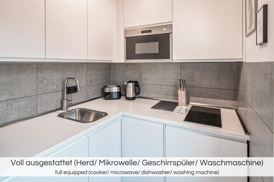 Kitchen or kitchenette, dishwasher, stove, toaster, washing machine, kitchen