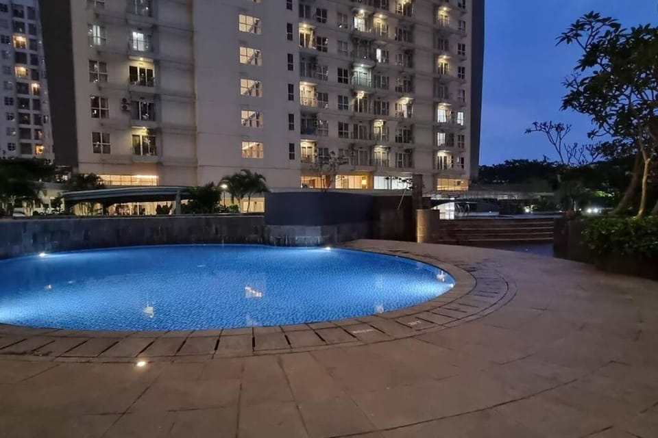 Apt Casa De Parco Studio Tema Gray With Wifi, Pool and Netflix Apartment in West Java