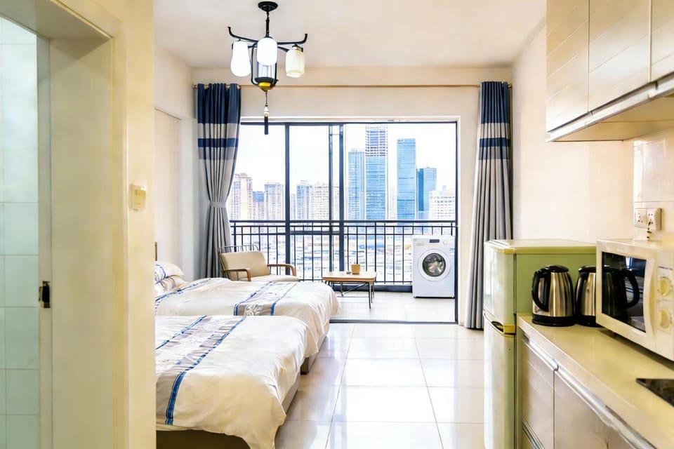 Bed, Night, TV and multimedia, Coffee/tea facilities, Kitchen or kitchenette, Photo of the whole room, Bedroom, minibar, toaster, towels, washing machine, air conditioner