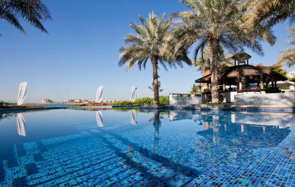 Premium 4BR Apt Pool Palm Beach Club Dubai Apartment in Dubai