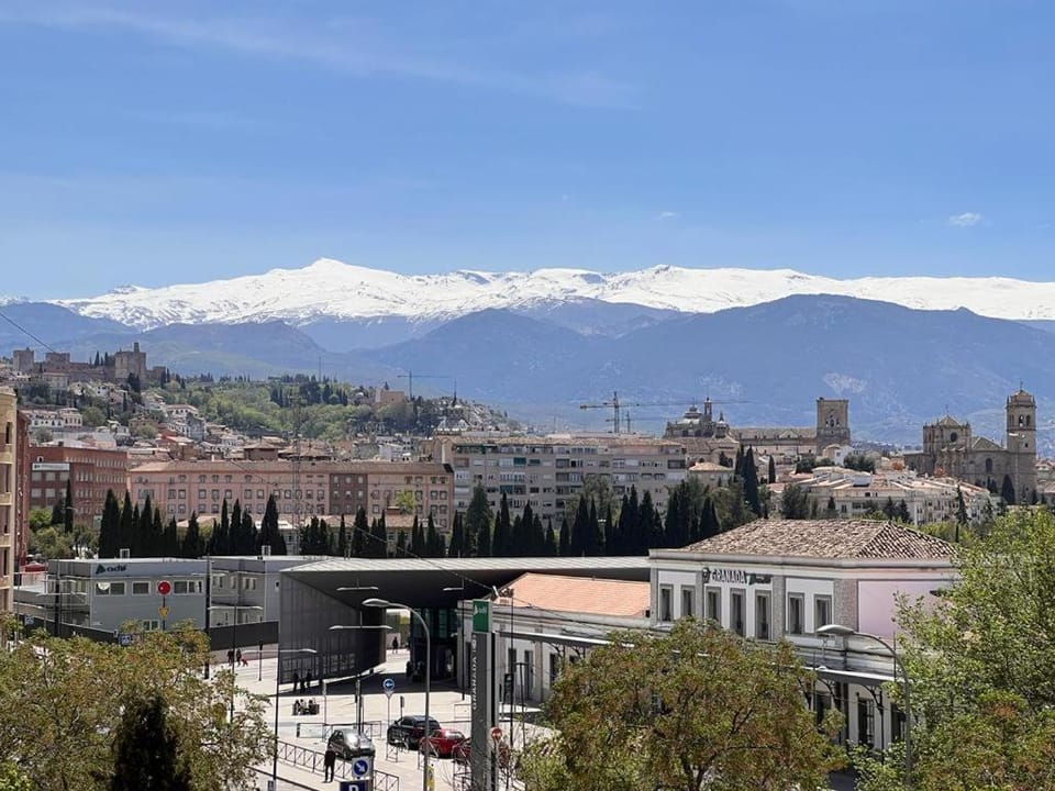 Property building, Nearby landmark, Off site, Day, Natural landscape, City view, Mountain view