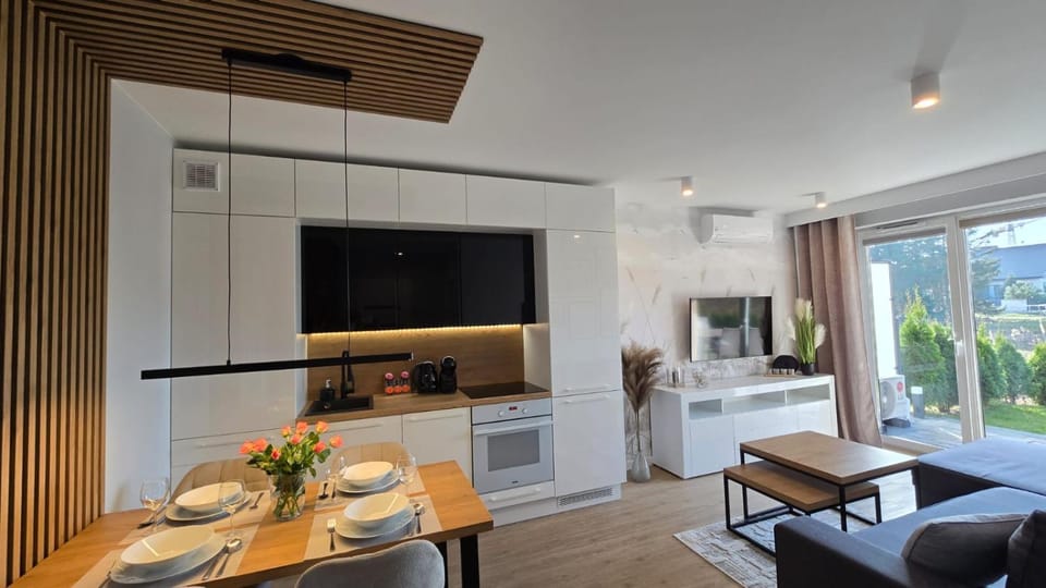 TV and multimedia, Kitchen or kitchenette, Living room, Photo of the whole room, Seating area, Dining area, pet friendly