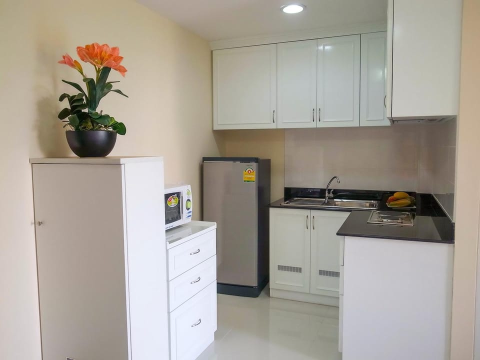 Kitchen or kitchenette, stove