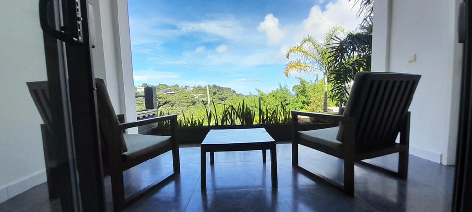 Natural landscape, Balcony/Terrace, Seating area, Garden view, Sea view