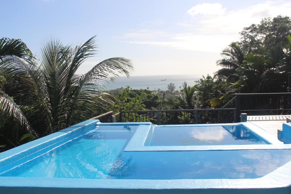 Property building, Day, Natural landscape, Pool view, Sea view, Swimming pool