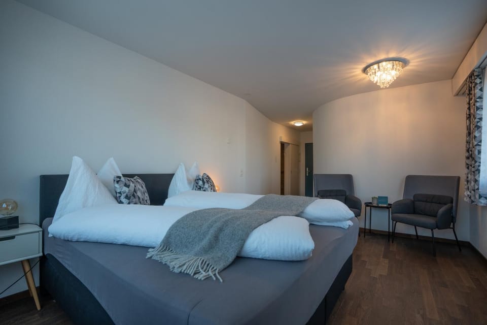 Bed, Seating area, Bedroom