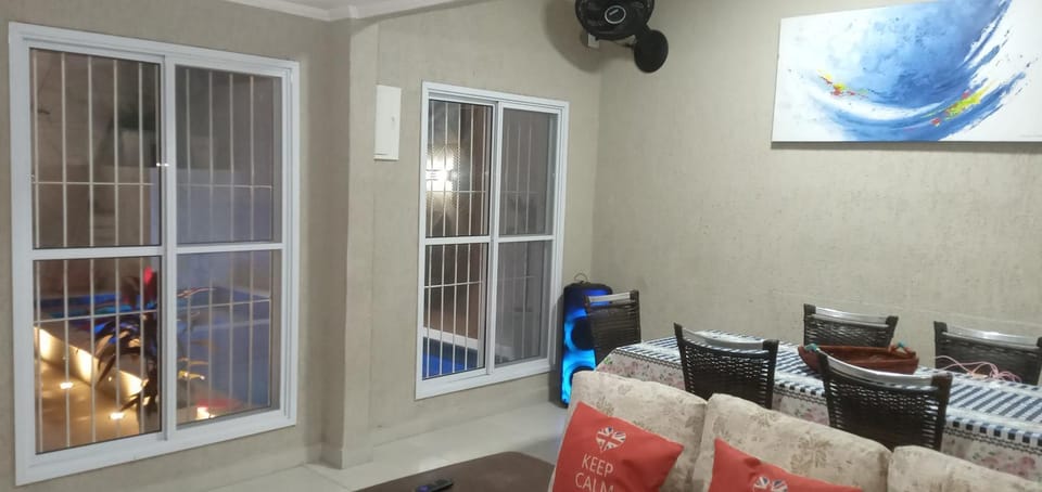 Living room, Seating area, Dining area, Pool view