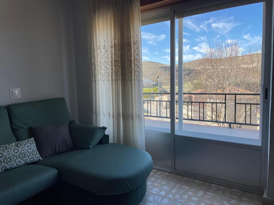 Natural landscape, View (from property/room), Balcony/Terrace, Living room, Seating area, Mountain view